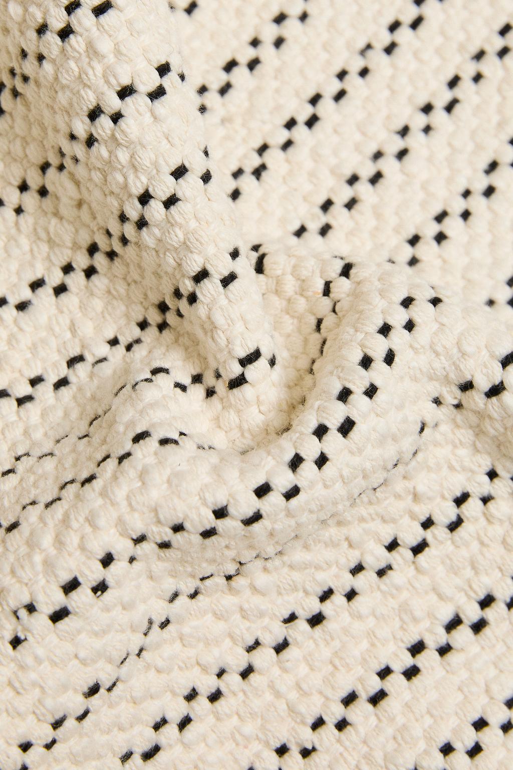 Коврик для ванны с топстежкой