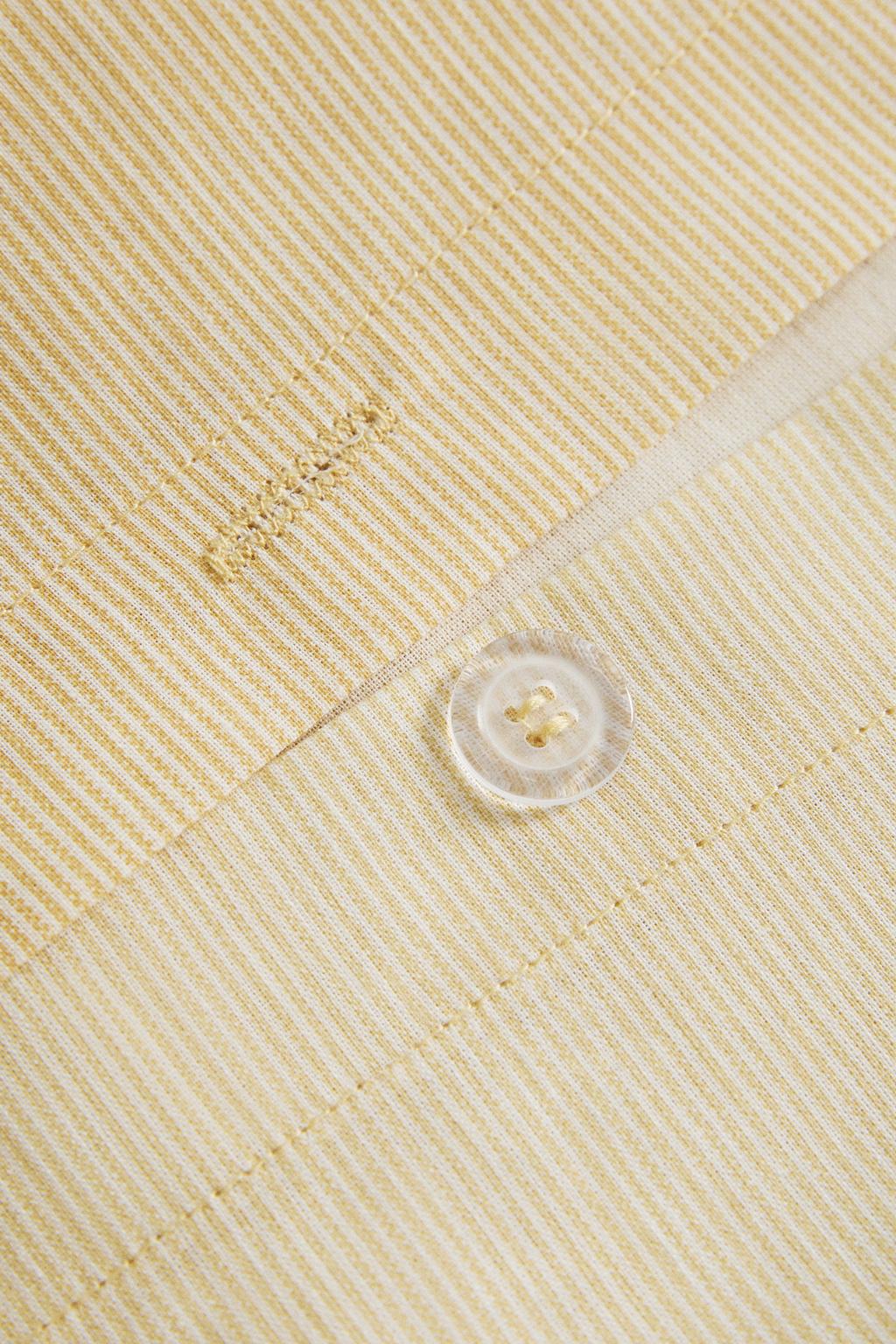 Реверсивное одеяло с полосатым узором