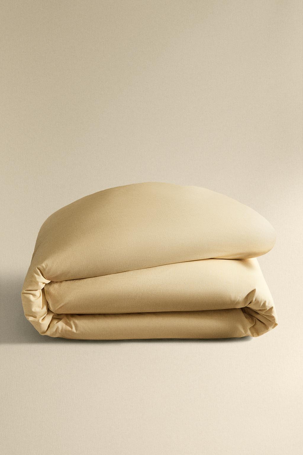 Реверсивное одеяло с полосатым узором