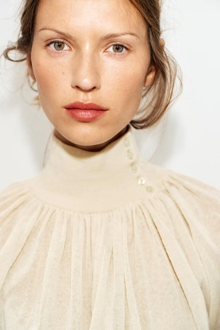 Блуза свободного кроя из комбинированного трикотажа- Заказать в России