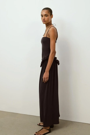 Объемное платье с баской- Заказать в России