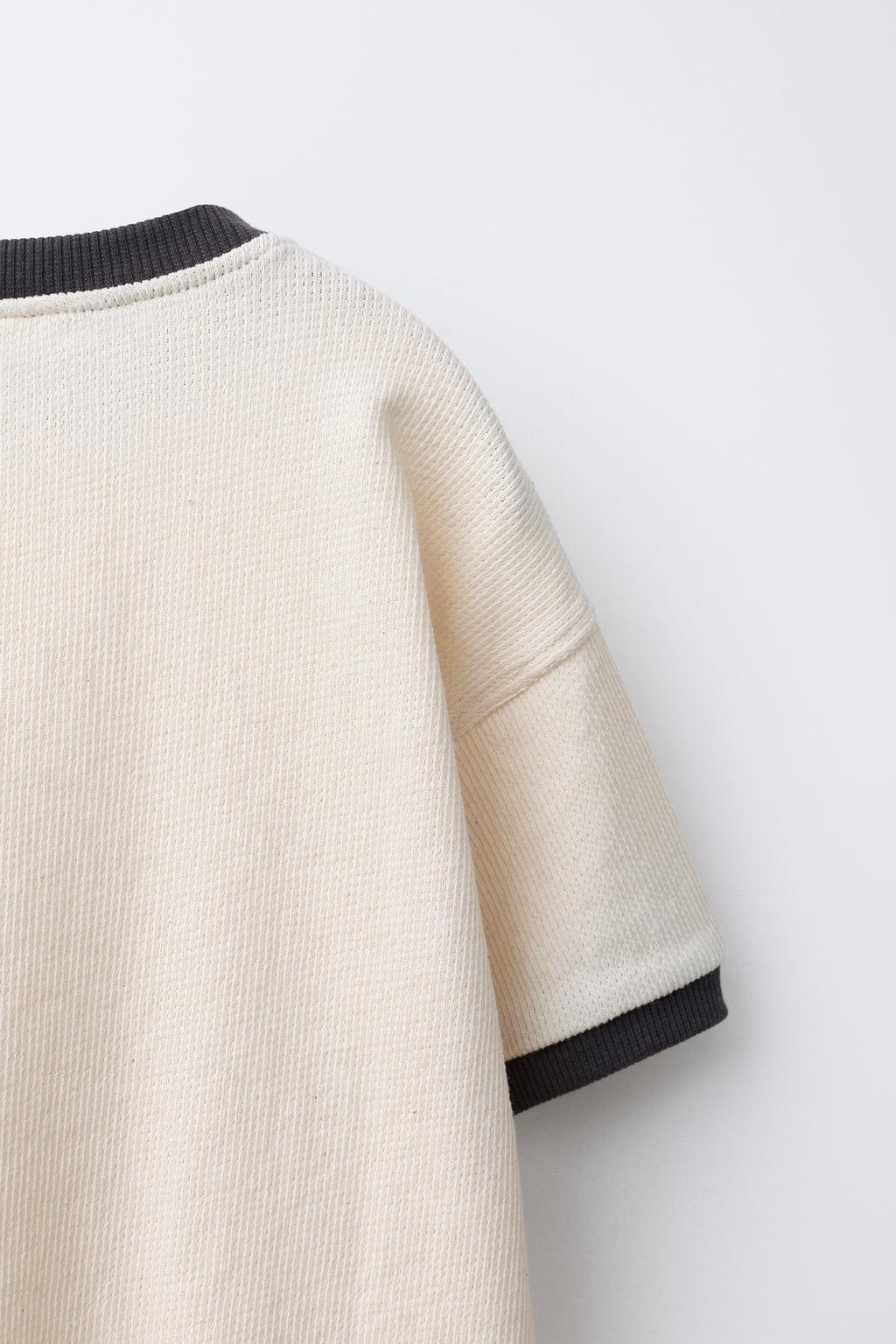 ФУТБОЛКА В РУБЧИК С КАРМАНОМ