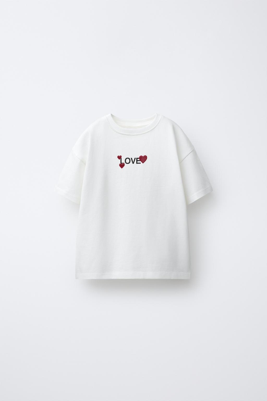 Футболка с блестящим принтом и резиновым покрытием