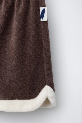 Шорты-бермуды из махровой ткани с этикеткой- Заказать в России