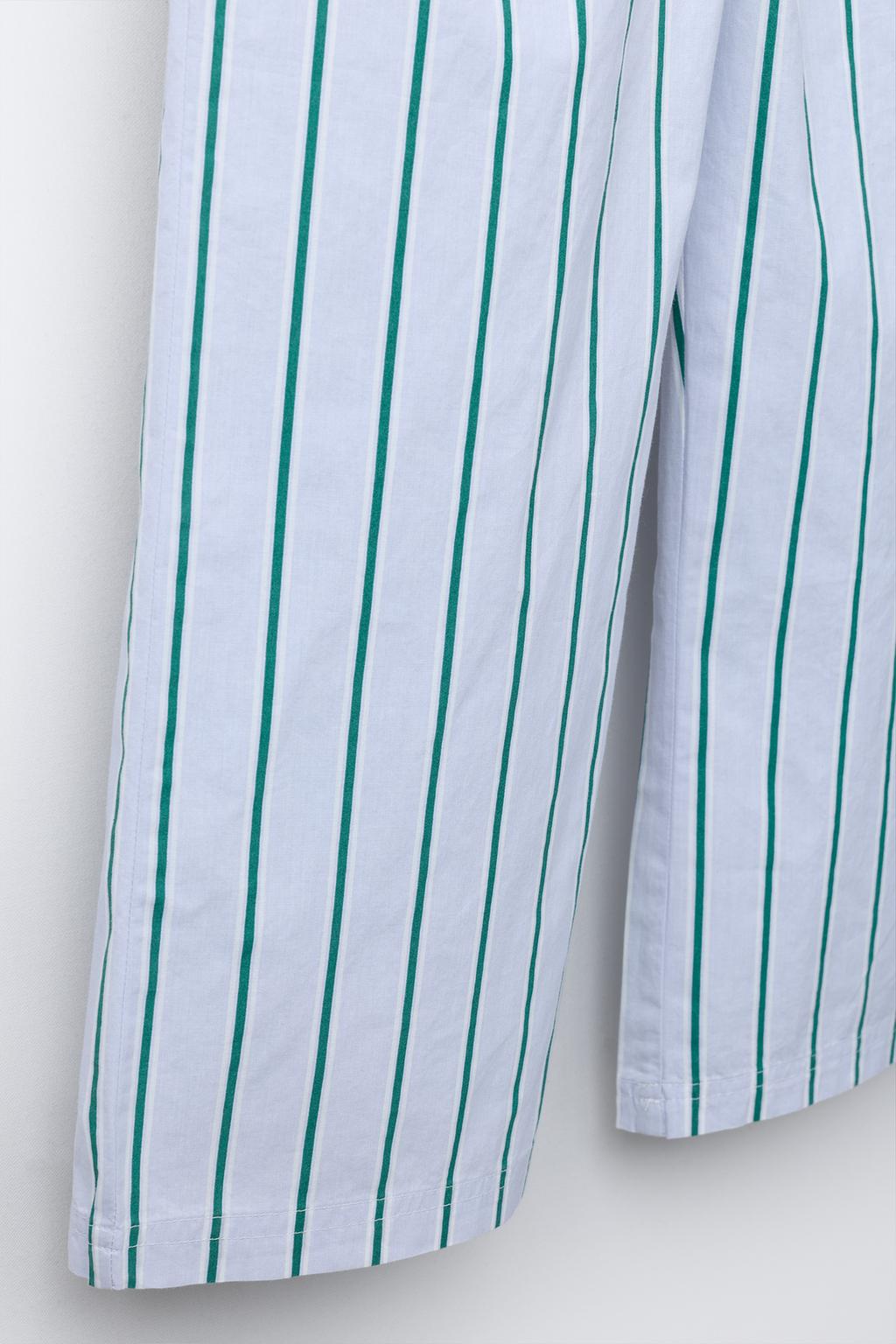 БРЮКИ В ПОЛОСКУ С ПРИНТОМ