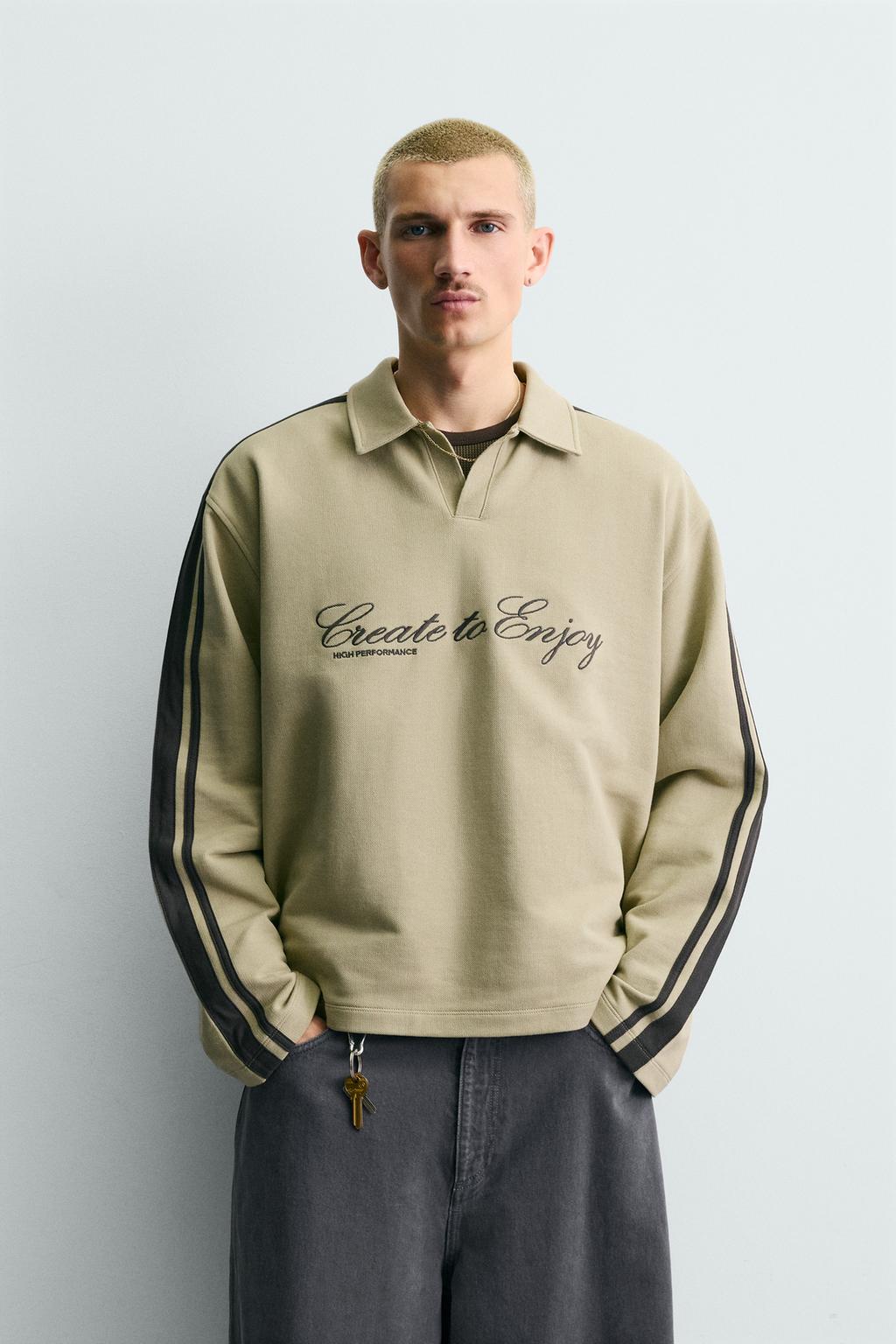 ТОЛСТОВКА СВОБОДНОГО КРОЯ В ПОЛОСКУ С ВЫШИВКОЙ