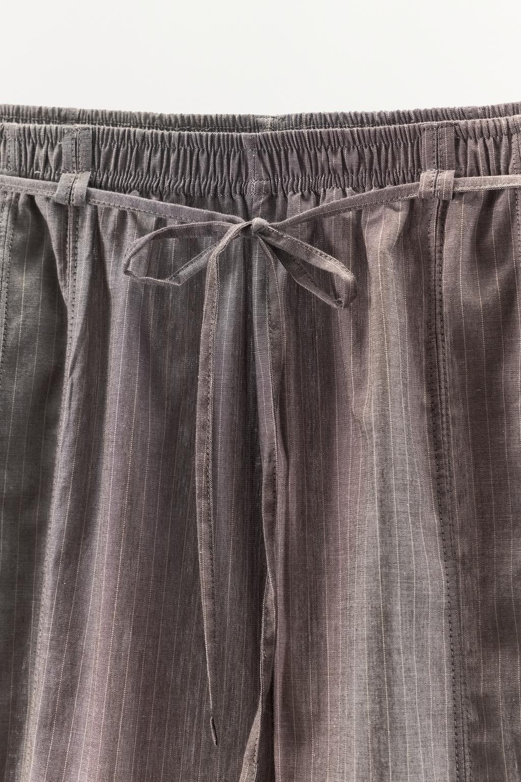 ШИРОКИЕ БРЮКИ В ПОЛОСКУ С ПОЯСОМ