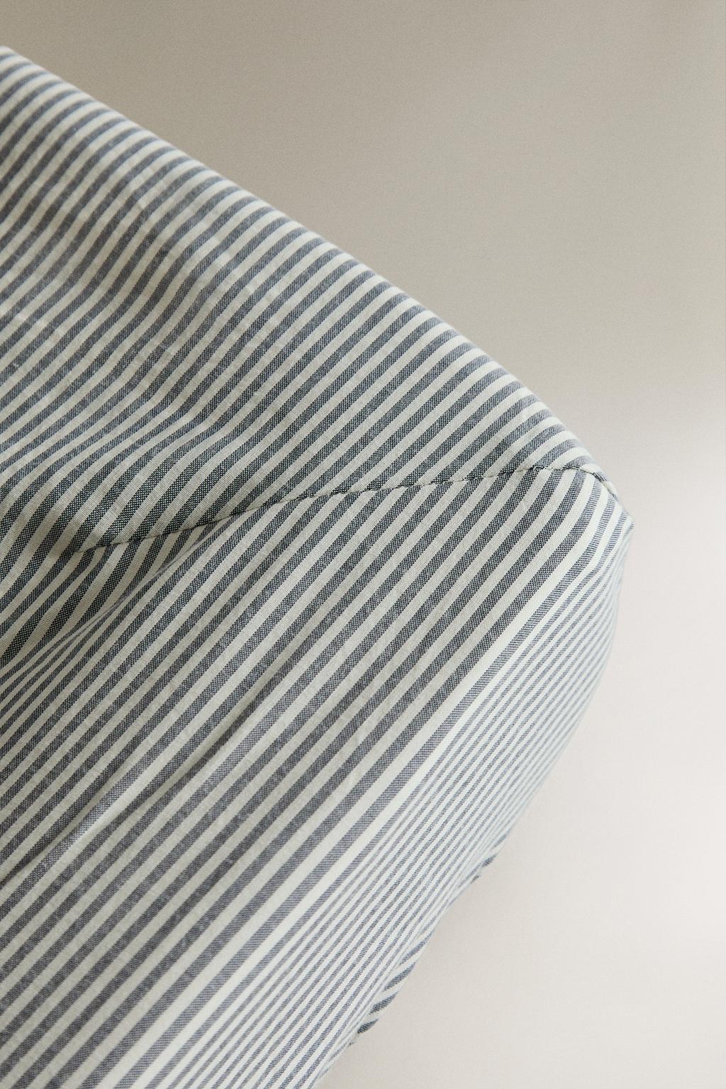 Наматрасник для пеленального столика в полоску