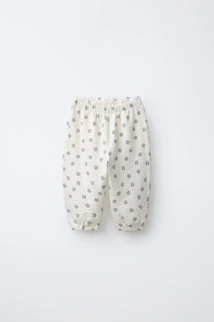 Брюки из рельефной ткани с принтом «кролики»- Заказать в России