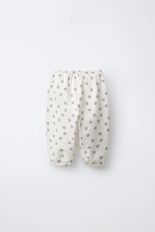 Брюки из рельефной ткани с принтом «кролики»- Заказать в России