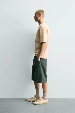 Футболка с принтом и эффектом потертости- Заказать в России