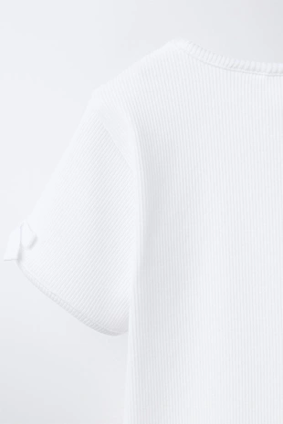 Футболка в рубчик с бантами- Заказать в России