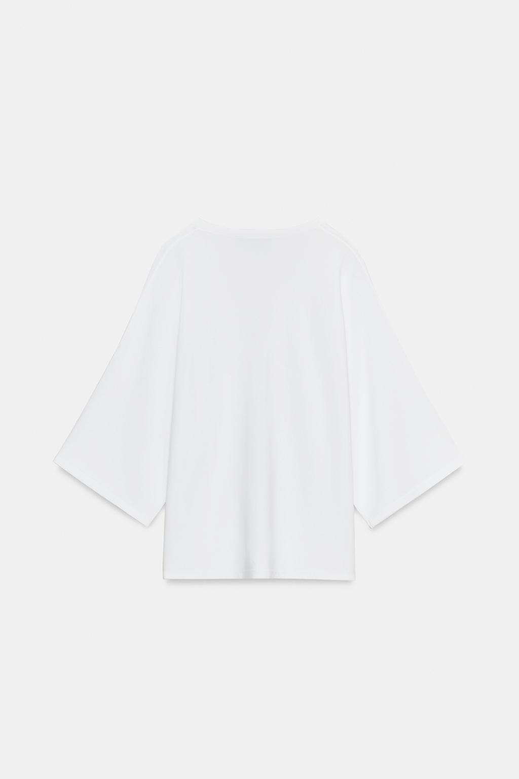 СВОБОДНЫЙ ДЖЕМПЕР С V-ОБРАЗНЫМ ВЫРЕЗОМ