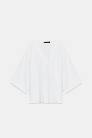 Свободный джемпер с V-образным вырезом- Заказать в России