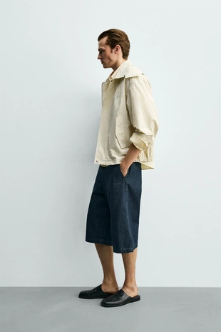 Укороченная парка из высокотехнологичной ткани с капюшоном- Заказать в России