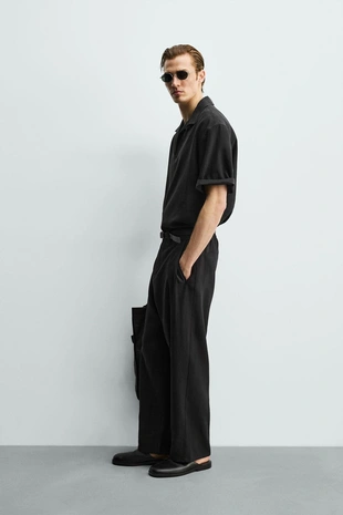 Брюки свободного кроя со складками- Заказать в России