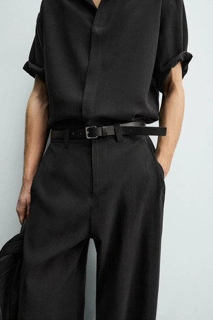 Брюки свободного кроя со складками- Заказать в России