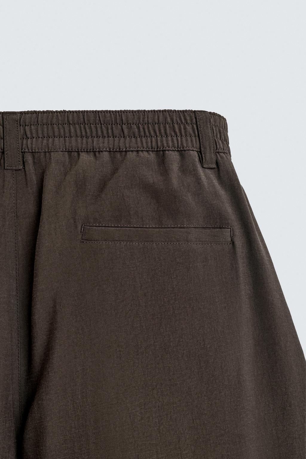 СТРУЯЩИЕСЯ БРЮКИ СО СКЛАДКАМИ