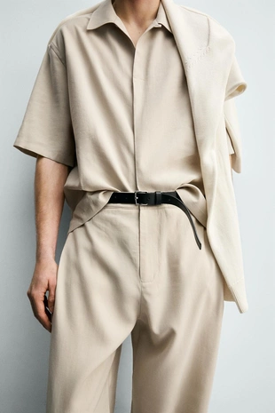 Брюки свободного кроя со складками- Заказать в России