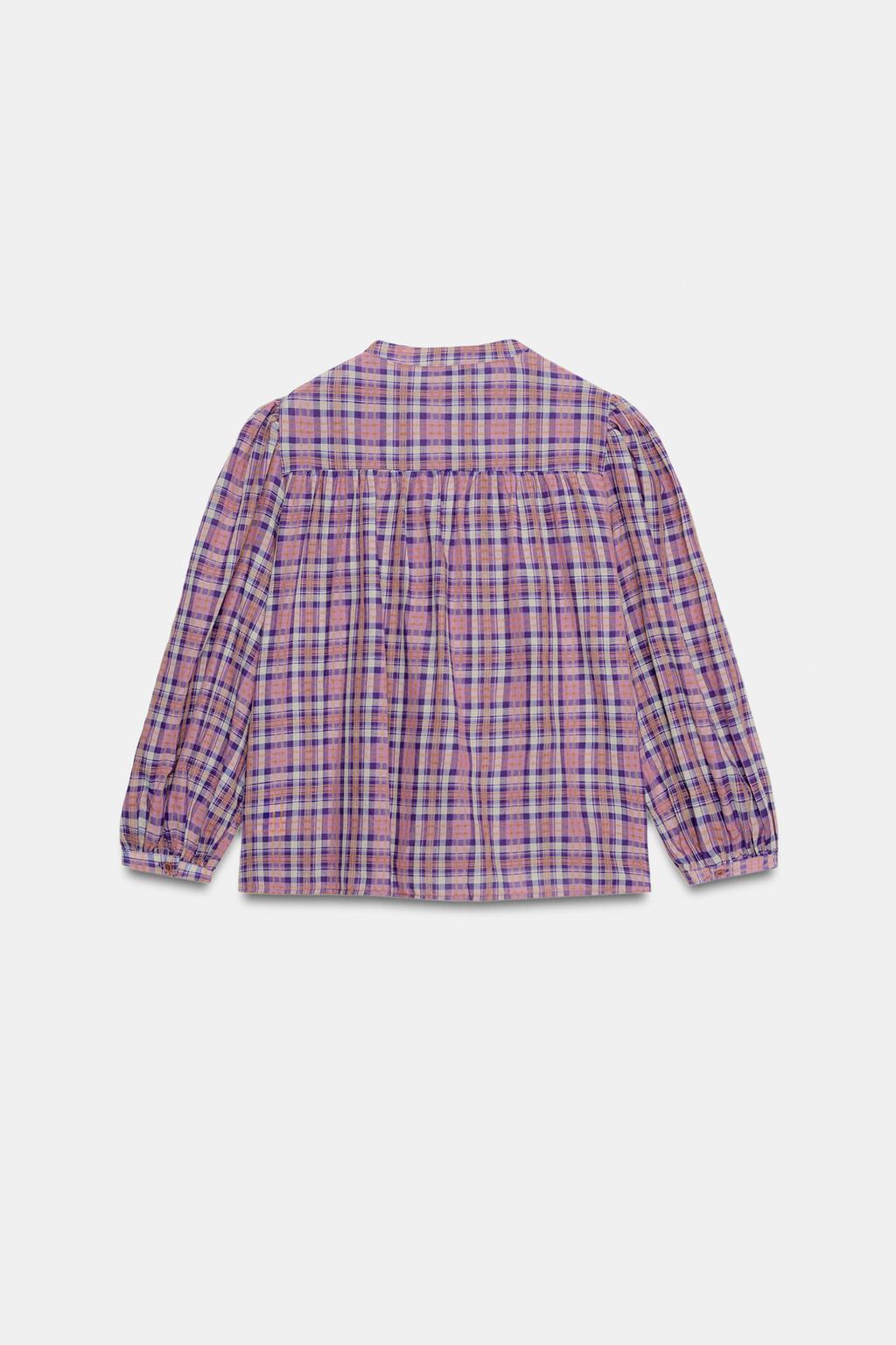 БЛУЗА В КЛЕТКУ С КРУГЛЫМ ВЫРЕЗОМ