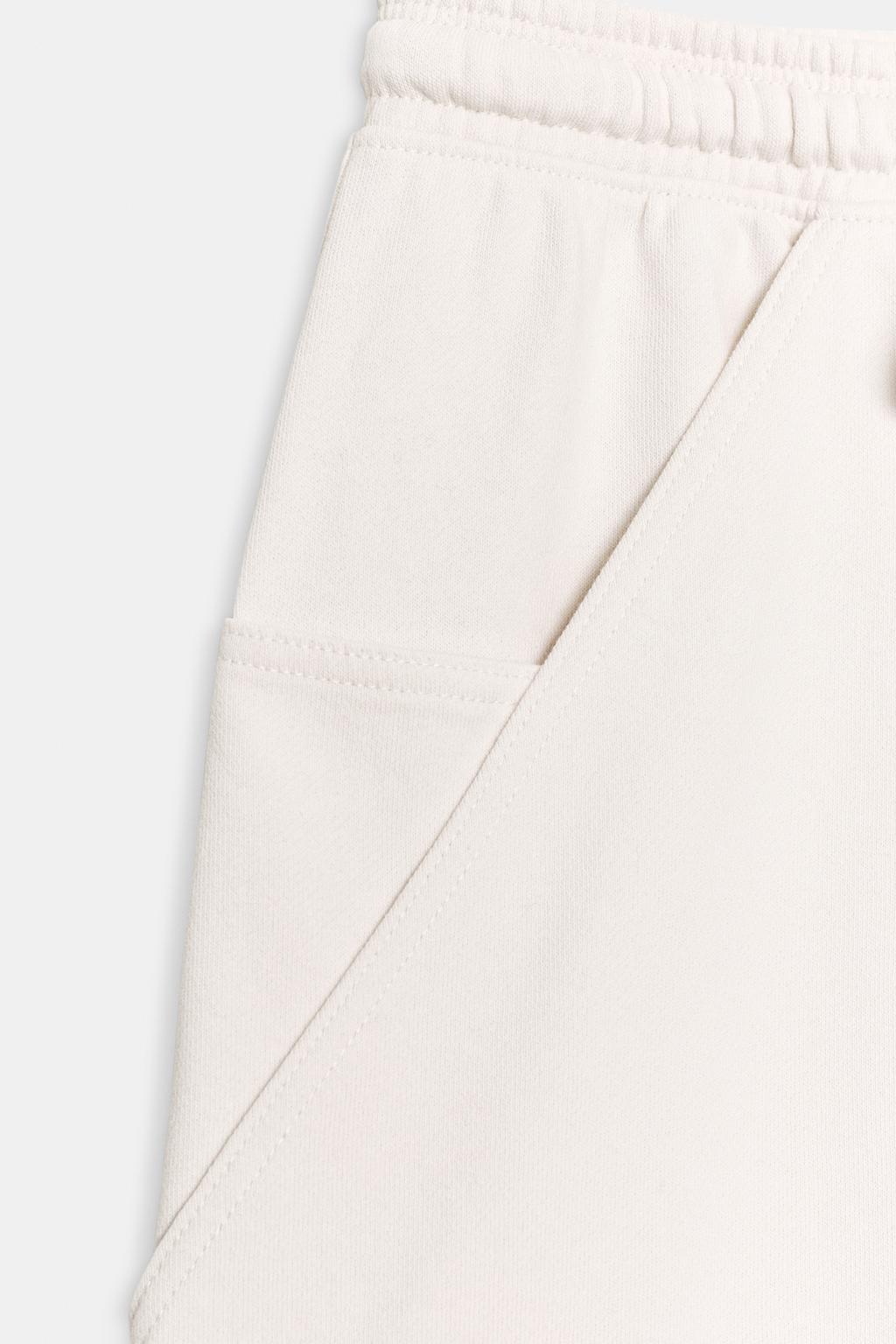 БРЮКИ-ДЖОГГЕРЫ С КАРМАНАМИ