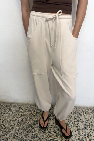 Брюки-джоггеры с карманами- Заказать в России