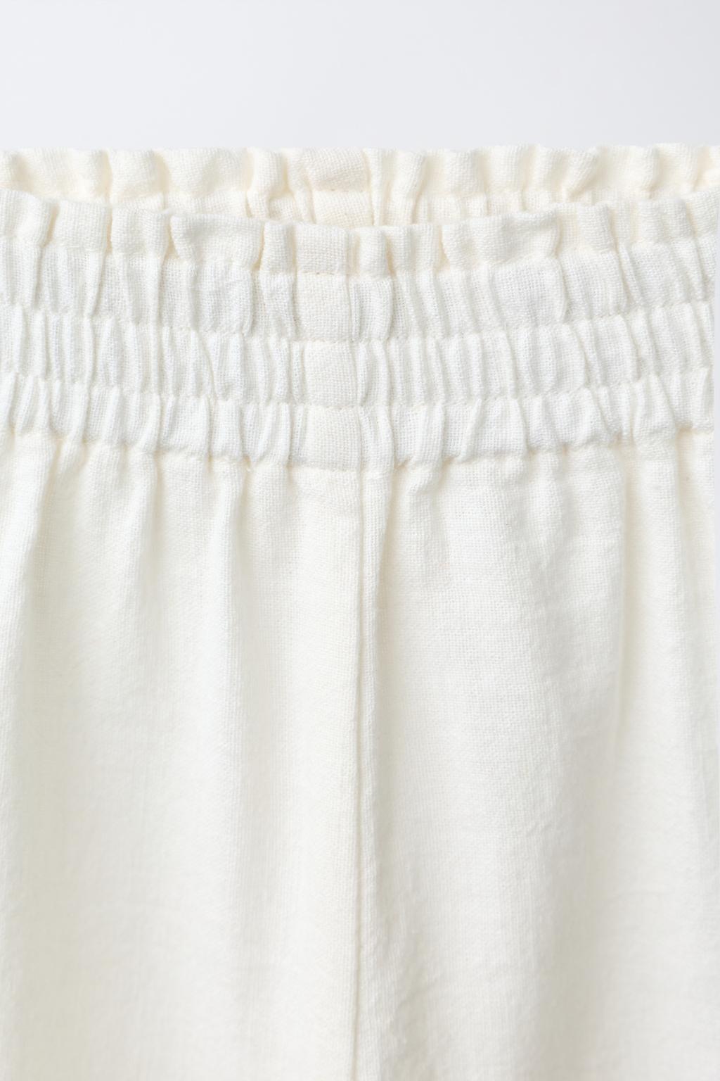 БРЮКИ-КЮЛОТЫ ИЗ ХЛОПКА И ЛЬНА С ВЫШИВКОЙ В ВИДЕ ЦВЕТОВ