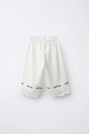 Брюки-кюлоты из хлопка и льна с вышивкой в виде цветов- Заказать в России