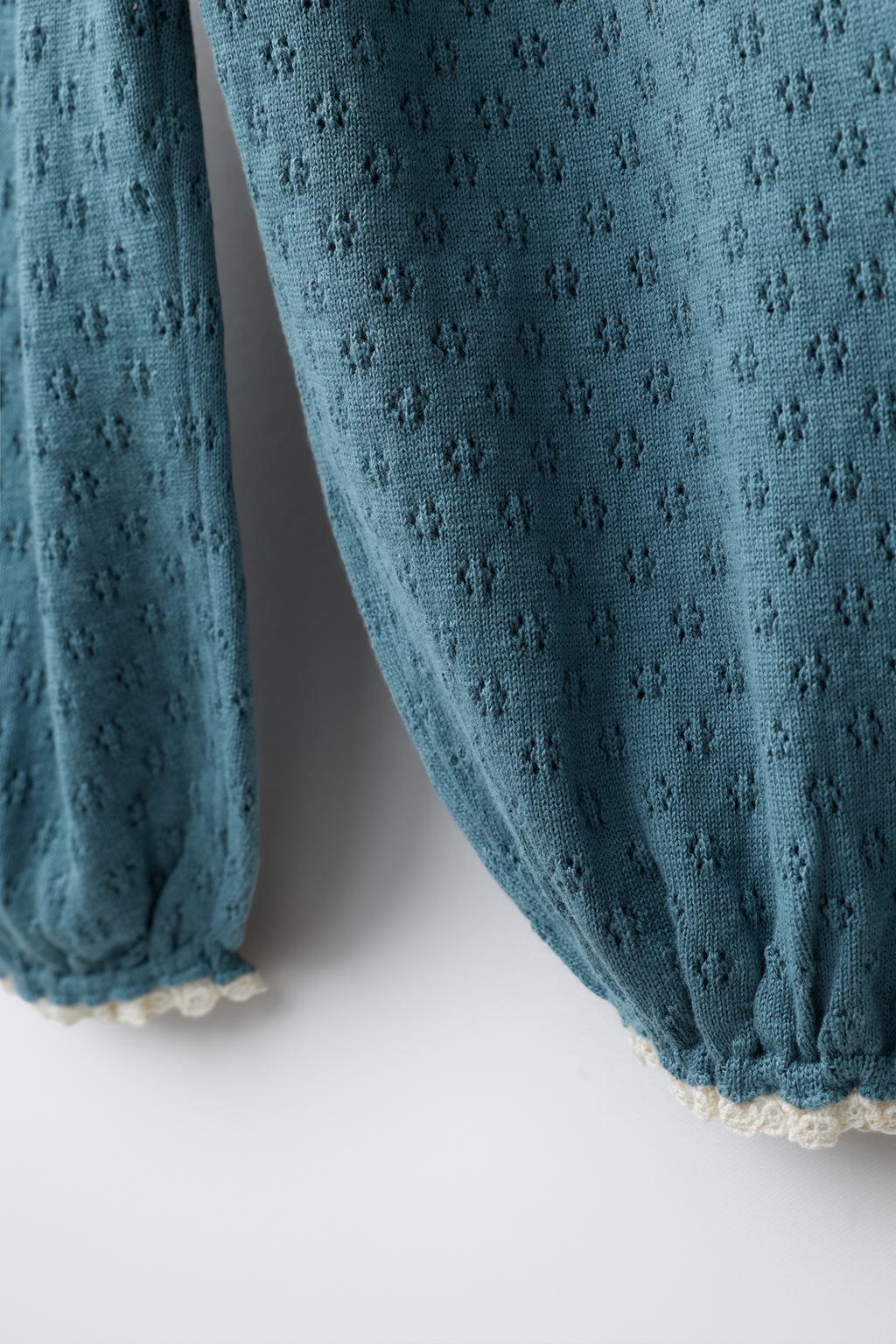 ТРИКОТАЖНЫЕ БРЮКИ С ВЫШИТЫМИ ЦВЕТАМИ