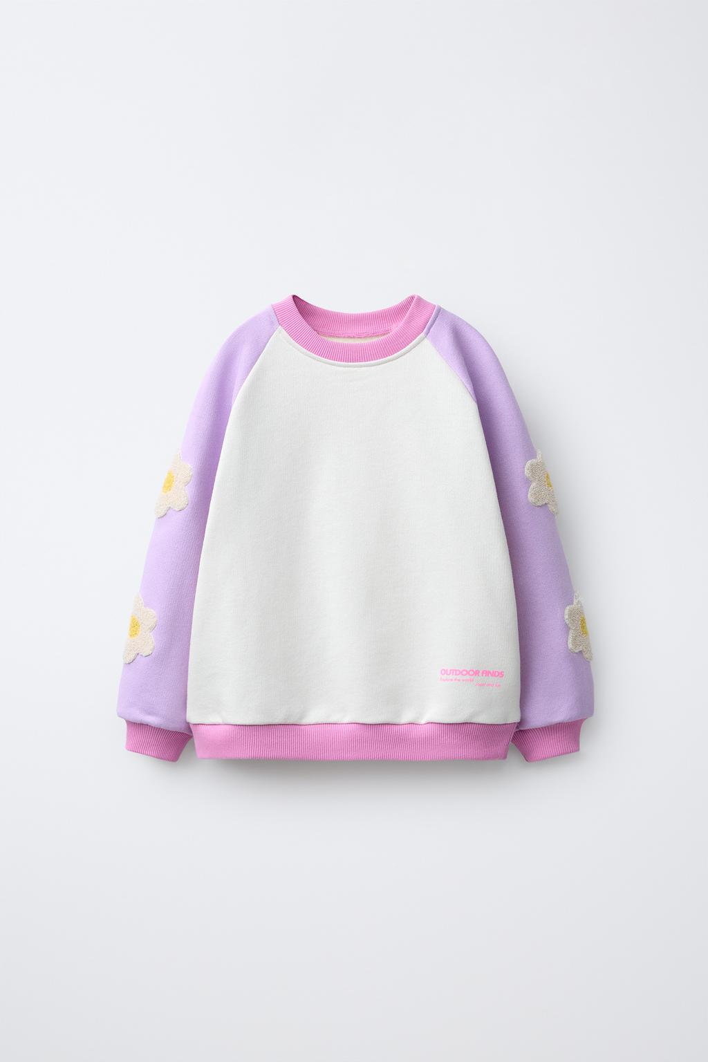 ТОЛСТОВКА С ЦВЕТОЧНЫМ ПРИНТОМ И КОНТРАСТНЫМИ РУКАВАМИ