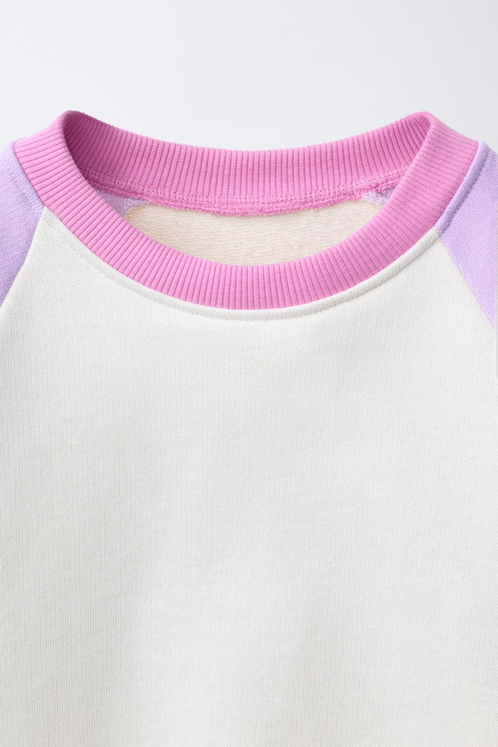 ТОЛСТОВКА С ЦВЕТОЧНЫМ ПРИНТОМ И КОНТРАСТНЫМИ РУКАВАМИ