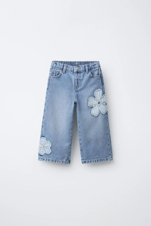 Джинсы  с цветочными патчами- Заказать в России