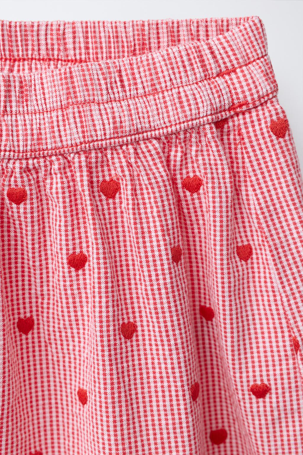 БРЮКИ-БАЛЛОН В КЛЕТКУ С ВЫШИВКОЙ В ВИДЕ СЕРДЕЦ