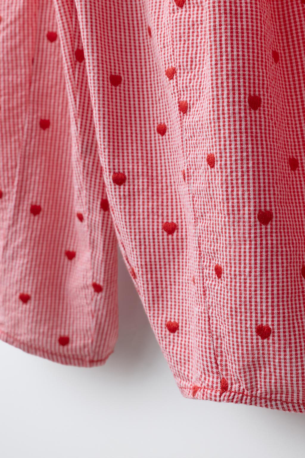 БРЮКИ-БАЛЛОН В КЛЕТКУ С ВЫШИВКОЙ В ВИДЕ СЕРДЕЦ