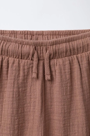 Брюки комбинированные текстурные- Заказать в России