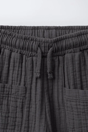 Шорты-бермуды с текстурой и комбинированными деталями- Заказать в России