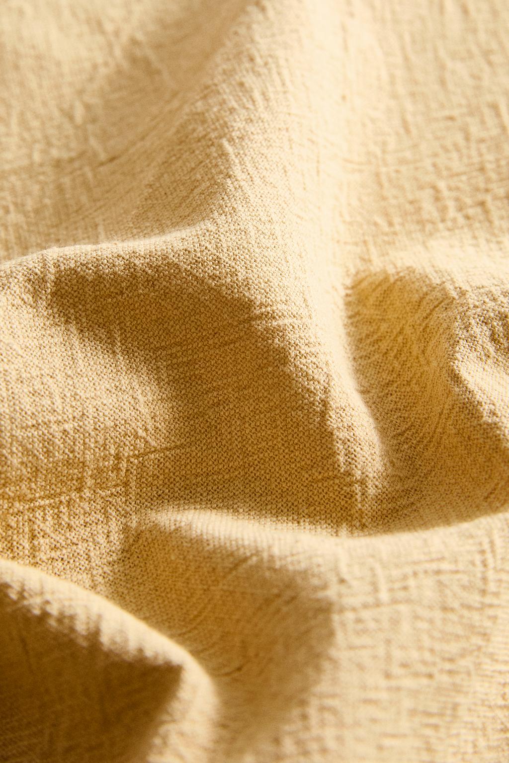 Набор однотонных салфеток с вышитым узором ниток (набор из 2)