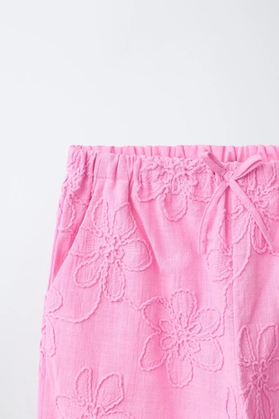 Брюки  с вышивкой цветов- Заказать в России