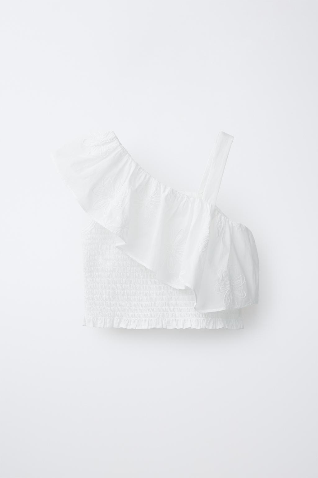 ТОП С АСИММЕТРИЧНЫМ ВОЛАНОМ