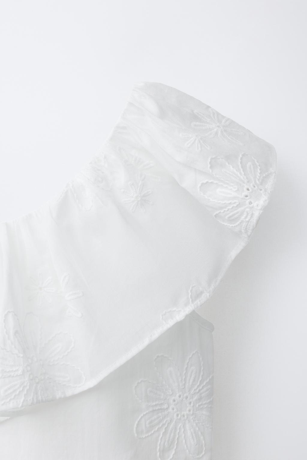 ТОП С АСИММЕТРИЧНЫМ ВОЛАНОМ