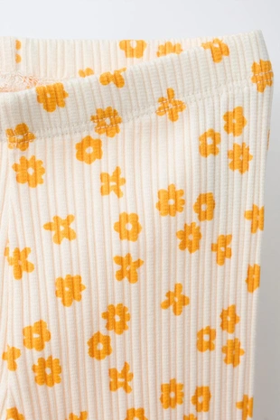 Легинсы в рубчик с цветочным принтом- Заказать в России