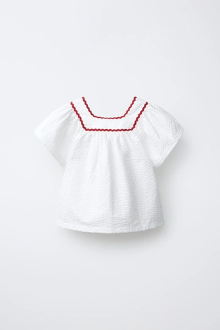 Топ из текстурной ткани с волнистым краем- Заказать в России