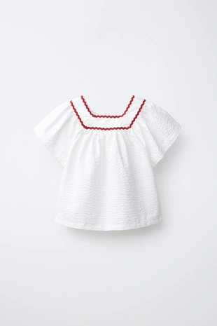 Топ из текстурной ткани с волнистым краем- Заказать в России