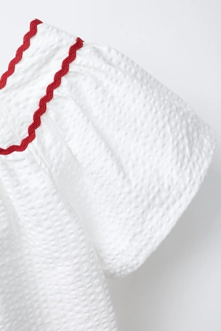 Топ из текстурной ткани с волнистым краем- Заказать в России