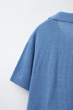 Поло из грубого трикотажа с карманом- Заказать в России