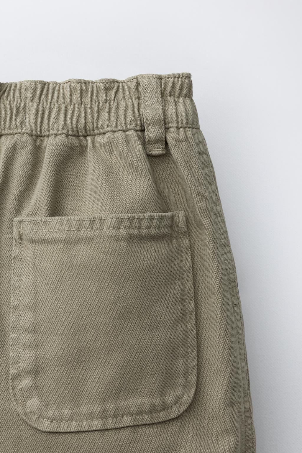 ШОРТЫ-БЕРМУДЫ С ЗАЩИПАМИ