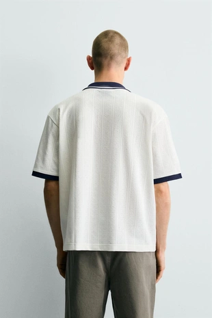 Вертикальное поло Jacquard с вышивкой