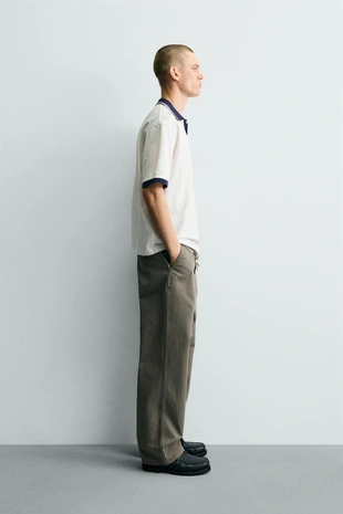 Вертикальное поло Jacquard с вышивкой