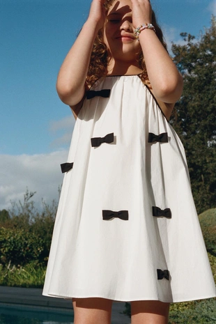 Платье с горловиной халтер и бантом- Заказать в России