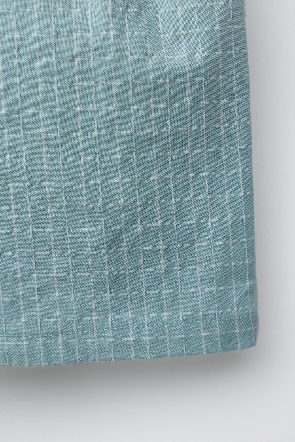 ШОРТЫ В КЛЕТКУ НА ПУГОВИЦАХ